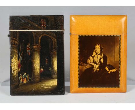 A 19th century papier-mâché visiting card case, decorated with scenes of an abbey, length 11cm, together with a Mauchline war