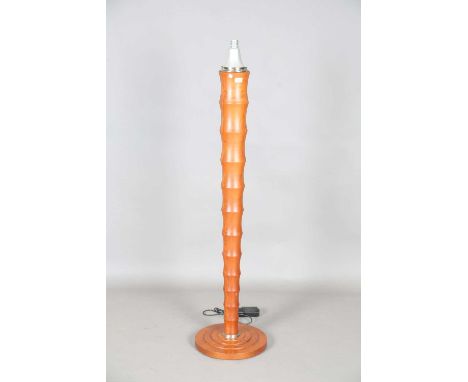 A modern turned wooden 'Palmus' floor standing lamp, designed by Leon Krier for Giorgetti, height 157cm (lacking shade).