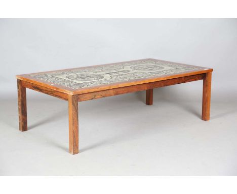 A mid-20th century teak rectangular coffee table of retro design, the top inset with a set of glazed ceramic tiles, height 42