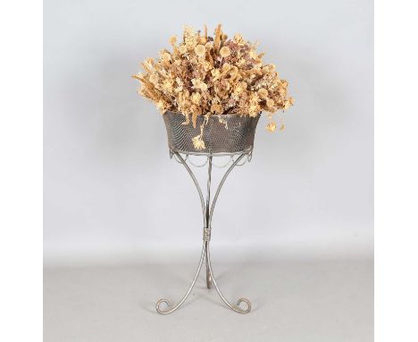 A 20th century wrought steel and mesh plant stand, raised on a tripod support, height 85cm, diameter 42cm.