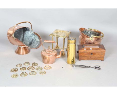 A group of mainly Victorian copper and brasswares, including a Victorian kettle, a brass footman and a coal scuttle, together