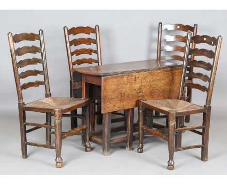 An 18th century provincial oak gateleg breakfast table, height 70cm, length 96cm, depth 96cm, together with a set of four 20t