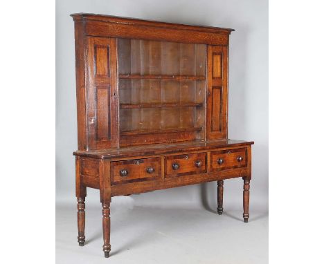 A Victorian oak dresser, the shelf back above three drawers, with overall mahogany crossbanded borders, height 207cm, width 8