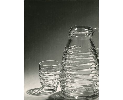  KHLEBNIKOV, ALEXANDER (1897-1979) Glass Jug and Tumbler . Gelatin silver print, 40 by 30 cm. Photographed and printed c. 196