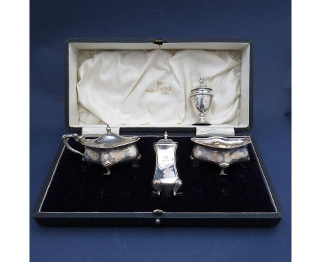 A silver Walker & Hall condiment set, Birmingham 1942 (glass liner to mustard missing) of vase form and a silver pepperette, 