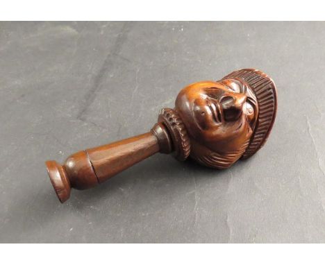 A late 18th / early 19th Century nut cracker of a medieval gentleman wearing a hat 