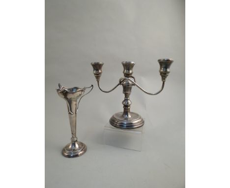 A silver William Adams metamorphic singular on triple candlestick, Birmingham 1990 with filled base and a James Deakin & Sons