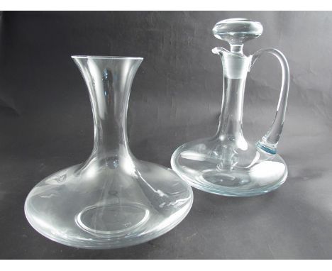 A clear glass carafe and a decanter with stopper (2)