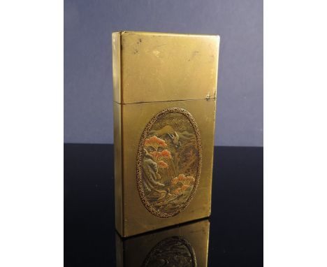 A Meiji period gilt card case with oval panel depicting a waterfall and birds monogrammed to reverse, signature to base