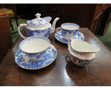 A Royal Crown Derby tea service for one, blue pheasant pattern