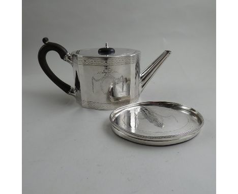 A Charles Aldridge and Henry Green George III silver teapot with fluted spout, swag engraved detail, ebony handle and knop wi