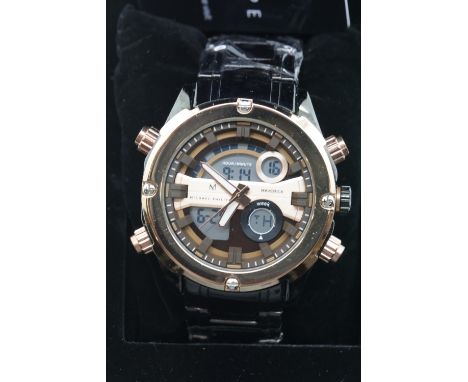 New boxed Michael Philippe gents wristwatch with rose gold dial on a black rubber strap. P&amp;P Group 1 (£14+VAT for the fir