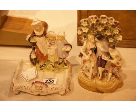 Two ceramic family figurines. Not available for in-house P&amp;P. 