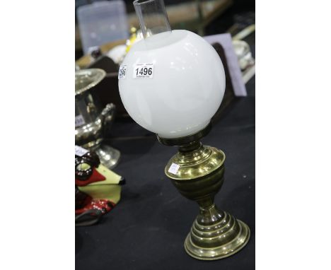 Large Victorian type brass oil lamp with milk glass globe shade. This lot is not available for in-house P&amp;P. 