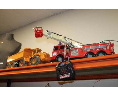 A TOY FIRE ENGINE + A TRUCK