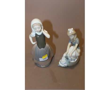 TWO NAO GIRL FIGURINES