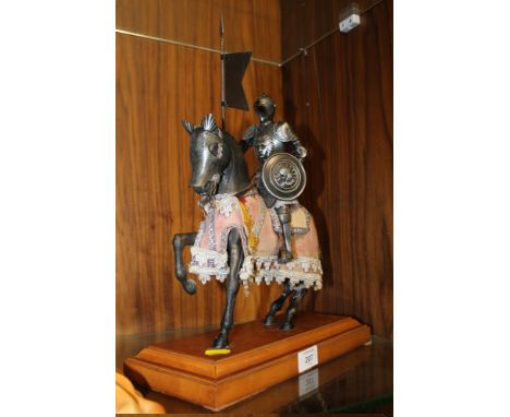 A VINTAGE KNIGHT ON HORSEBACK FIGURE