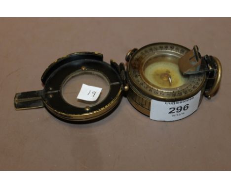 A BRASS CASED VINTAGE COMPASS