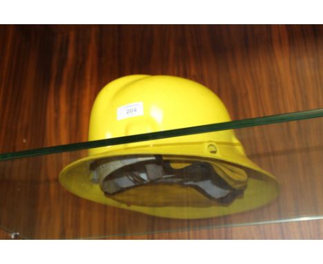 A VINTAGE AMERICAN FIRE HELMET