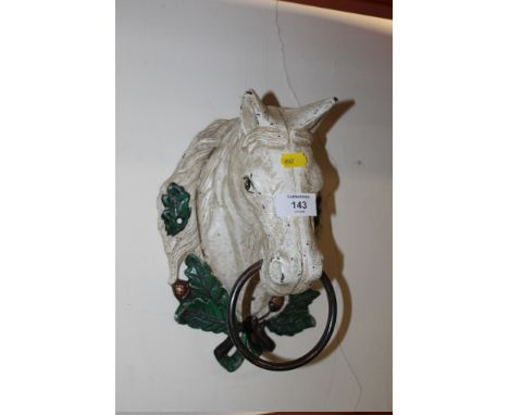 A CAST HORSE HEAD DOOR KNOCKER