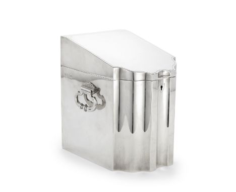 DUNHILL: a rare silver humidorAlfred Dunhill, London 1959Modelled as a knife box with serpentine front, hinged shaped-oval dr