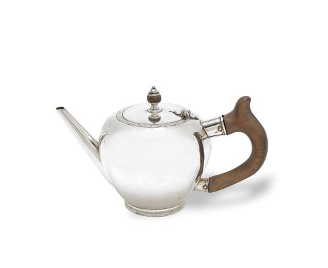 A George II Irish provincial silver bullet teapotWilliam Clarke of Cork, Dublin 1728 Of conventional form with a straight spo