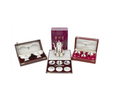 A cased coaster and bottle opener setAsprey, London 1984 / 1985 Comprising a bottle opener and six coasters, with engine-turn