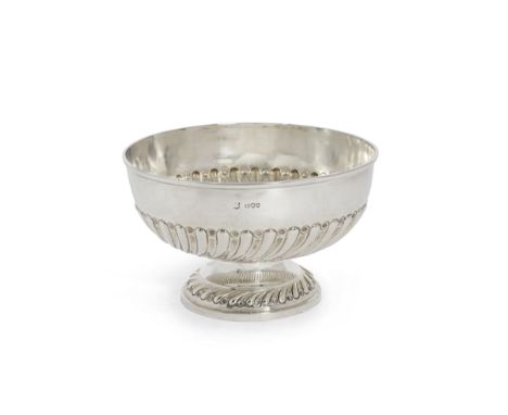 A Victorian silver punch bowlGibson &amp; Langman, London 1874 With gadroons and fluting, diameter 25.5cm, weight 26.5oz.For 