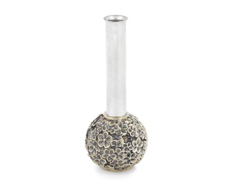 STUART DEVLIN: A silver and silver-gilt vaseLondon 1981 The spherical body with a floral design, height 12cm, weight 6oz.For 