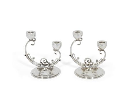 A pair of Danish silver two-light candelabraHolger Rasmussen, circa 1950, also stamped Sterling DenmarkThe nozzles issuing fr