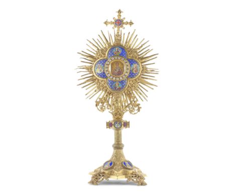 A 19th century  Continental  gilt brass and champlevé enamel  Monstranceprobably French in the Gothic revival taste, the cent