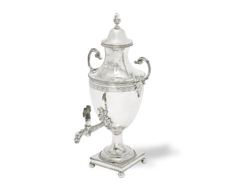 A George III Irish silver tea urnJohn Craig, Dublin, circa 1780 Urn form with two leaf embellished flying scroll handles, pul