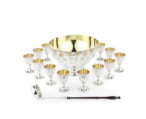 A silver punch bowl with ladle and a set of twelve gobletsbowl and ladle, Charles Fox, goblets, C J Vander Ltd, also engraved
