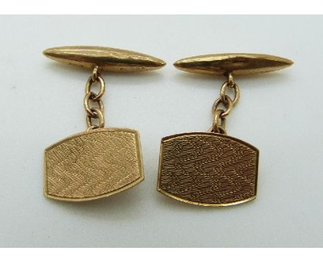 A pair of 9ct gold cufflinks with engine turned decoration, 3.51g