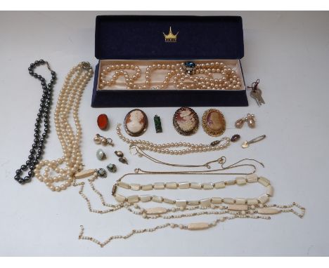 A collection of costume jewellery including a section of a Victorian ring, a silver brooch set with carnelian agate, a silver