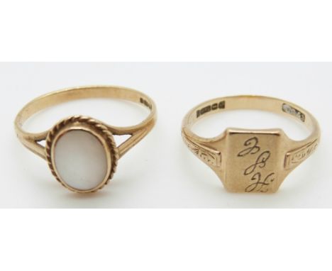 A 9ct gold signet ring and another set with mother of pearl 