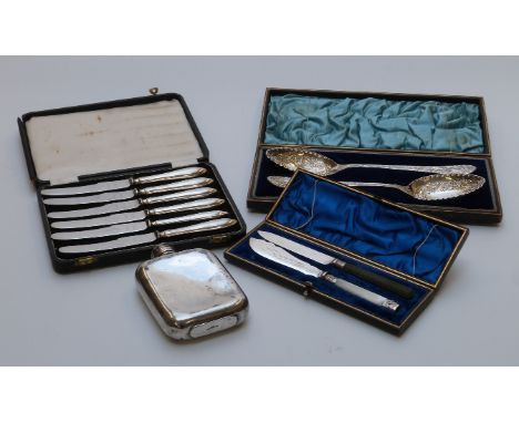 Cased cutlery including hallmarked silver handled knives, plated berry spoons and a  hip flask 