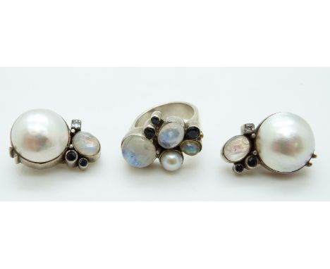 A silver ring set with pearl, moonstone and sapphires by Gatto Bianco, with matching earrings 