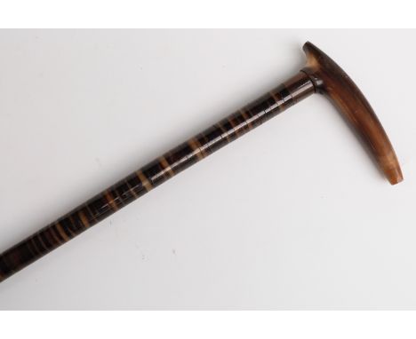 19thC horn-handled walking stick, the shaft formed as laminated discs of horn, length 87cm