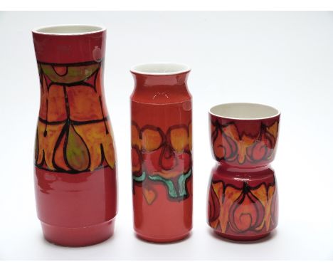 Three large Poole Pottery Delphis vases, tallest 39cm