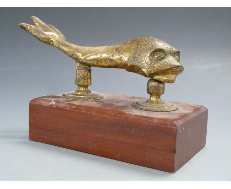 Brass door knocker in the form of a fish, marked Malta, length 28cm
