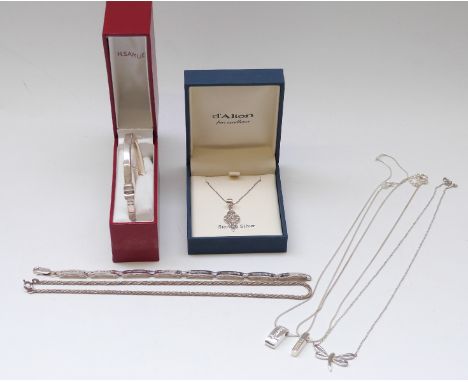 A silver bangle, silver bracelet set with cubic zirconia, necklace set with cubic zirconia, other silver necklaces and pendan