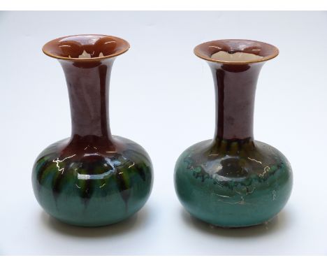 Two Sir Christopher Dresser for Linthorpe Pottery vases, one impressed HT and 363, 24cm tall