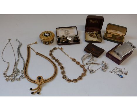 A collection of costume jewellery including necklaces, cufflinks, studs, Ronson lighter etc