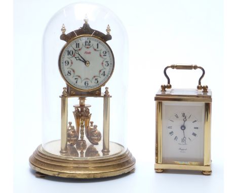 A 20thC English brass carriage clock in corniche style case, with ivory coloured Roman dial and Breguet style hands, signed R