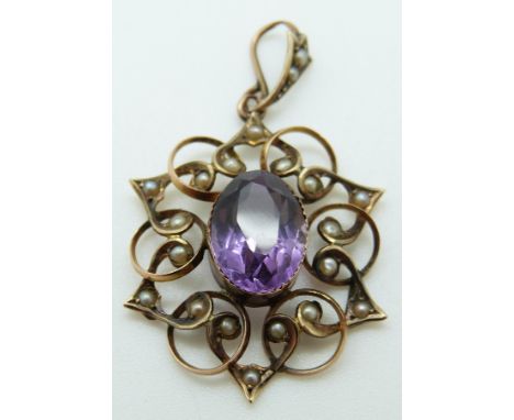 Edwardian 9ct gold pendant set with an oval amethyst and seed pearl by H & CB