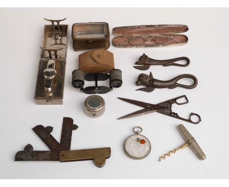 A selection of sundry items including glasses and white metal case, brass trinket box with glass lid, blood letting instrumen