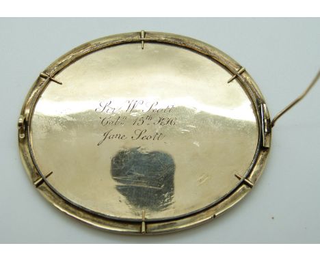 A miniature portrait brooch hand painted with an Indian dancing scene, inscribed to the reverse 'Sir W. Scott, Col. 15th KH, 