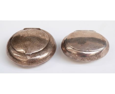 Two hallmarked silver pill or trinket pots, diameter of larger 5cm, weight of both 44g