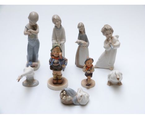 A collection of Lladro, Nao and Hummel figures